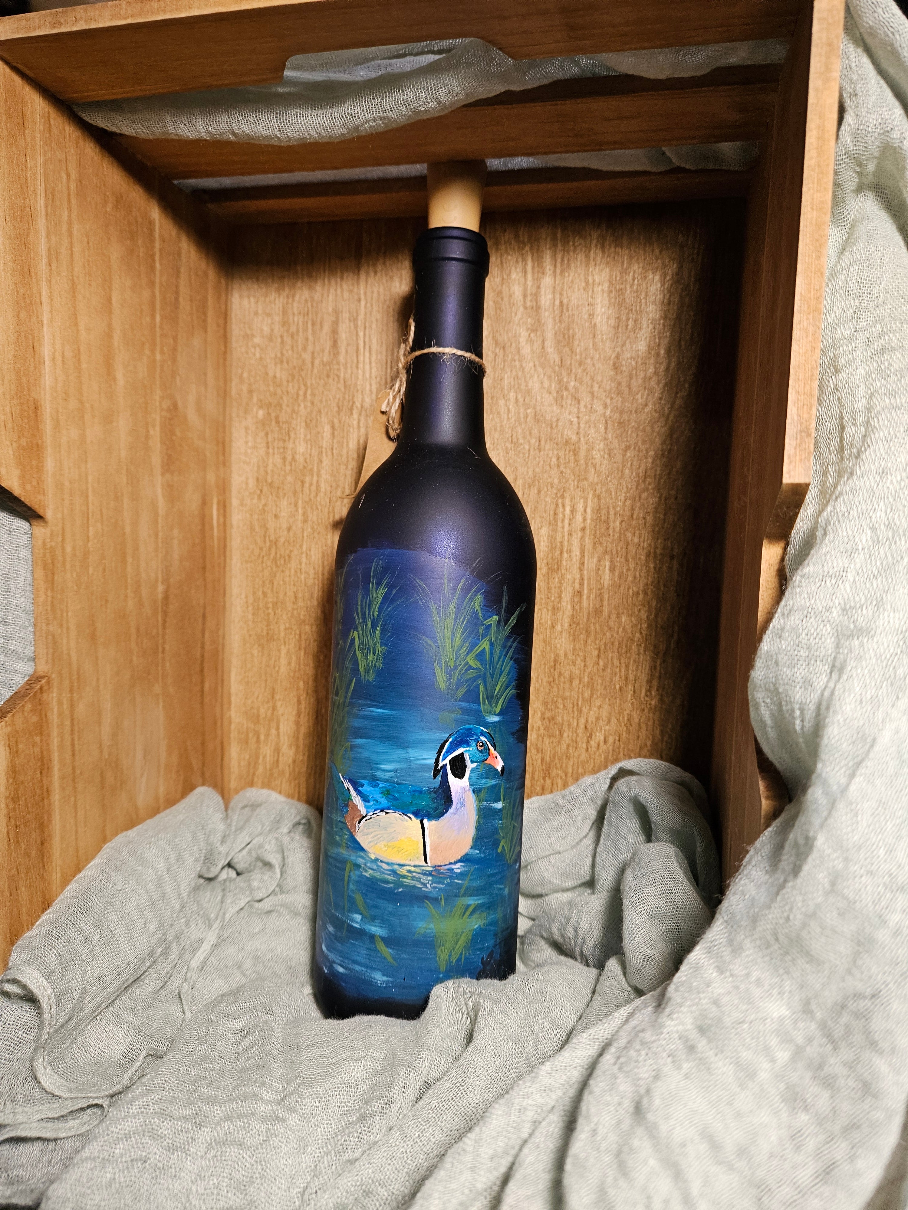 Hand-painted Wood duck on frosted wine bottle