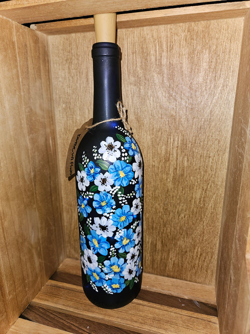 Hand-painted flowers on light up wine bottle