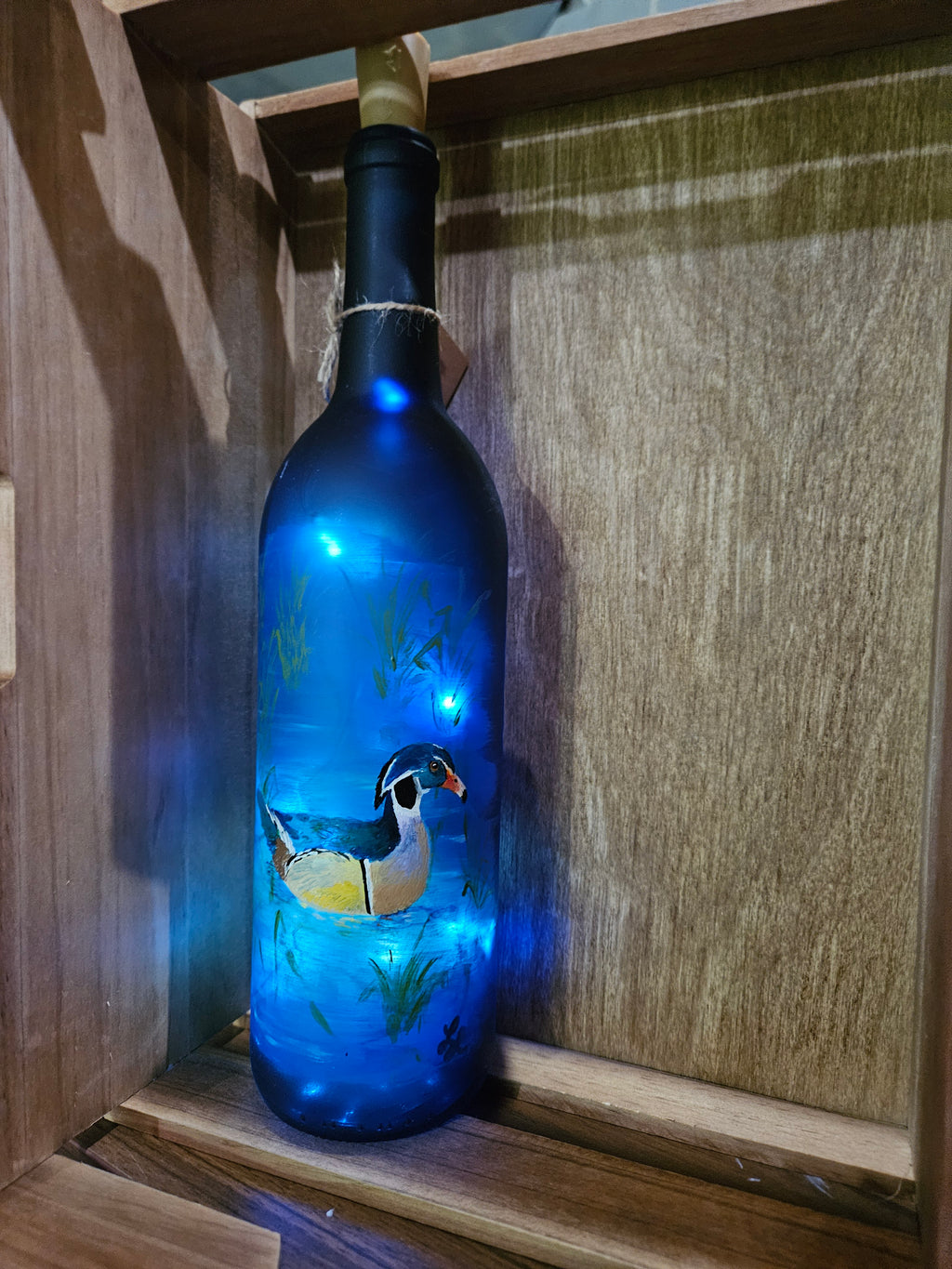 Hand-painted Wood duck on frosted wine bottle